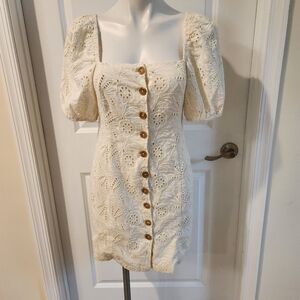 Free People new with tags size 4 embroidered cream dress with front buttons